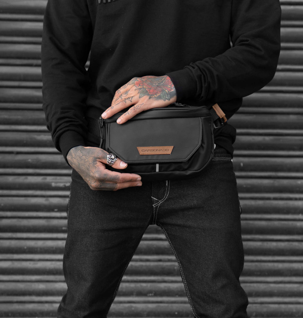 Carbonado's Urban compact waist pouch is made for the active lifestyle. The adjustable, Fidlock strap ensures a perfect fit, and we have a secret pocket for your valuables that blocks RFID readers. Finally, your waist pouch can keep up with you.
